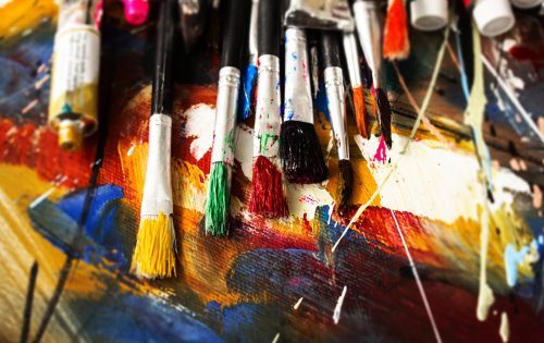 Artist paint brush on painting background