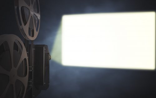 Vintage movie projector is projecting blank screen on wall. 3D rendered illustration.